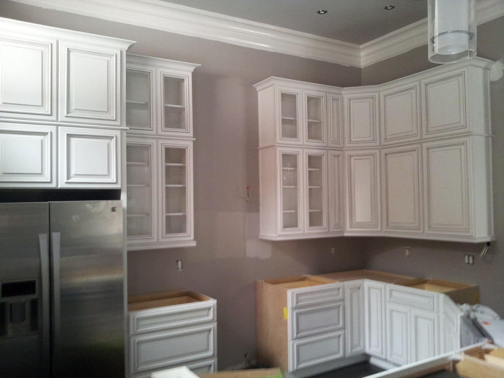 Classic kitchen/diner in Orlando with raised-panel cabinets.