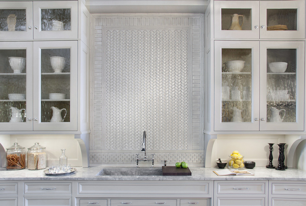 Photo of a medium sized contemporary single-wall kitchen in San Francisco with marble worktops, grey splashback and ceramic splashback.