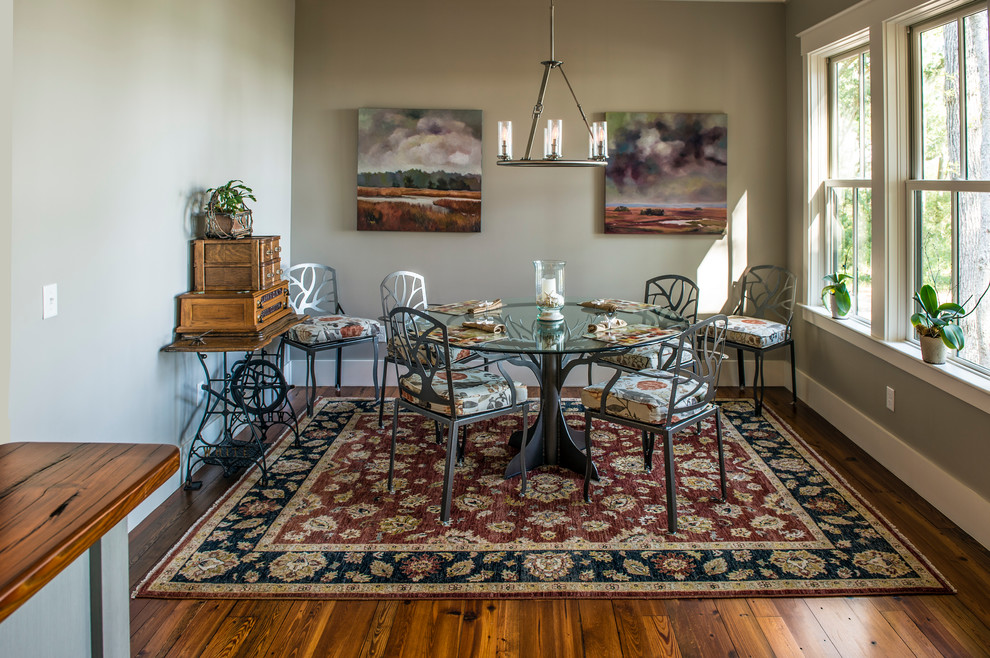 This is an example of a medium sized classic dining room in Charleston with medium hardwood flooring.