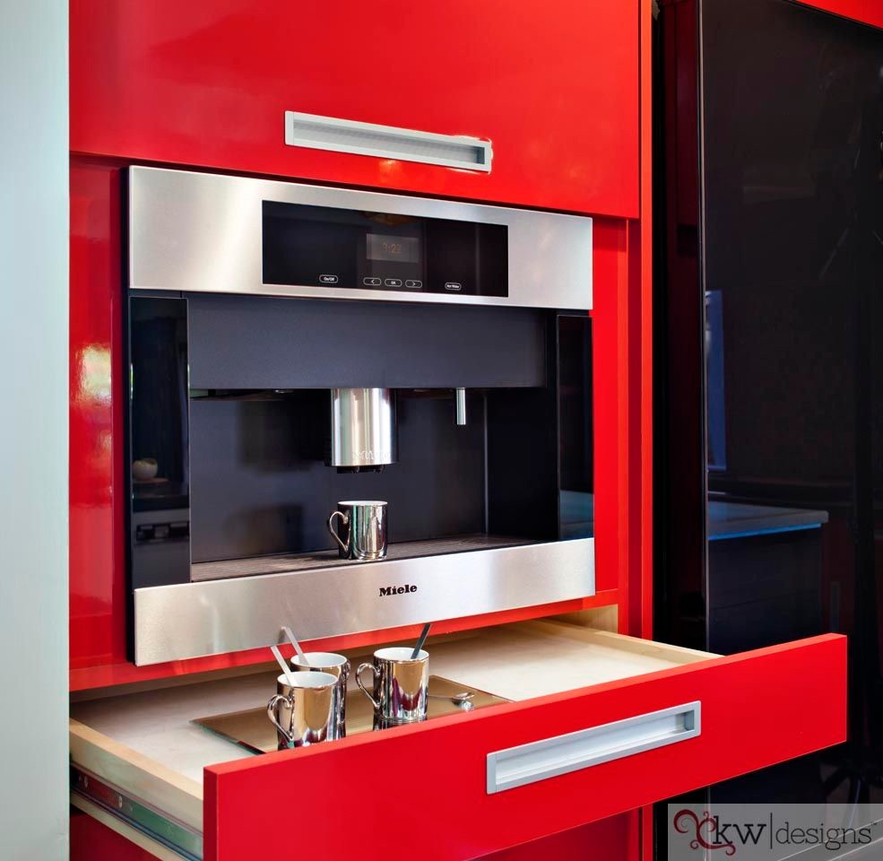 Example of a large minimalist u-shaped open concept kitchen design in San Diego with flat-panel cabinets, red cabinets, granite countertops, red backsplash, mosaic tile backsplash, black appliances and an island