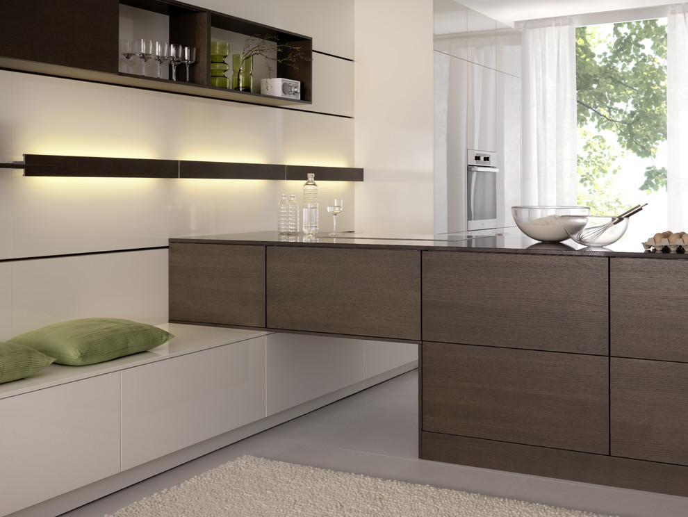 Inspiration for a modern open concept kitchen remodel in Boston with flat-panel cabinets, white cabinets and stainless steel appliances