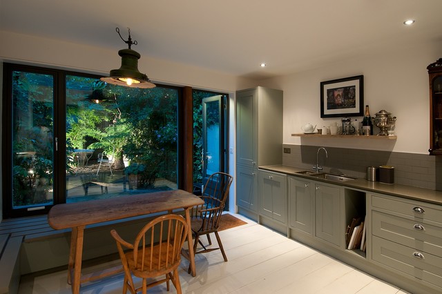 Bold Kitchen Makeover With Blue, Black and Brass Touches