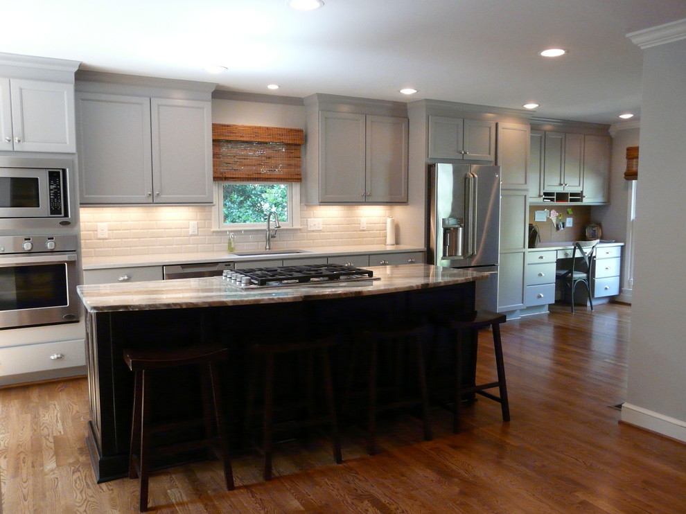 Huge transitional single-wall medium tone wood floor eat-in kitchen photo in Birmingham with an undermount sink, recessed-panel cabinets, gray cabinets, quartzite countertops, gray backsplash, porcelain backsplash, stainless steel appliances and an island