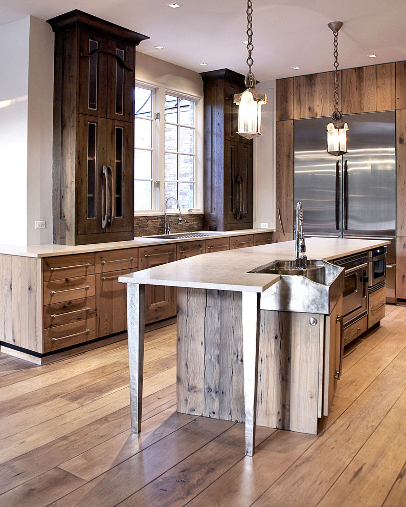 This is an example of a contemporary kitchen in Chicago with stainless steel appliances.