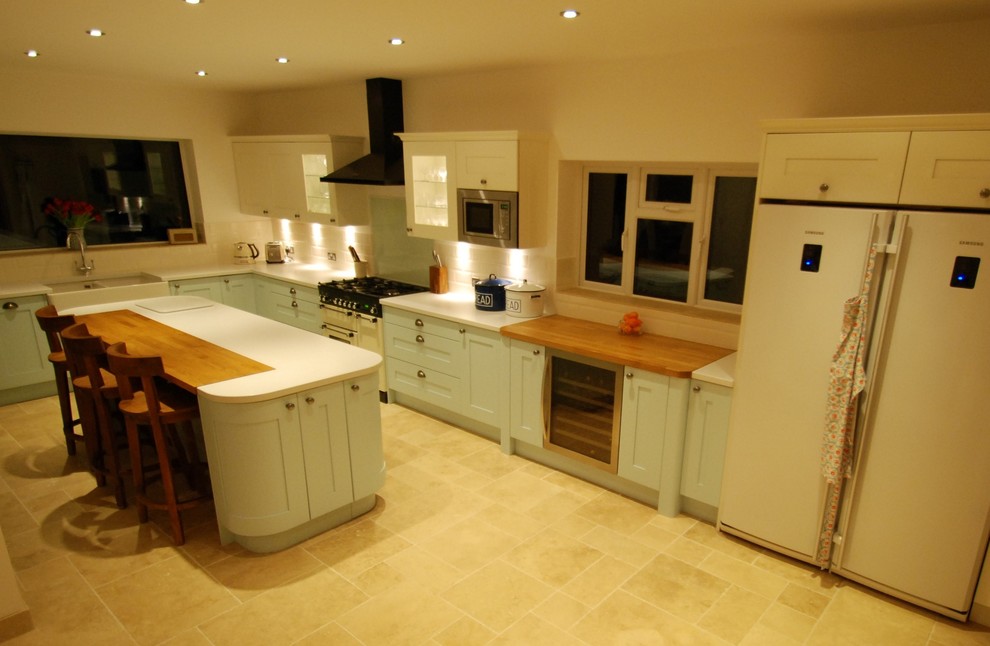 Kitchen - traditional kitchen idea in Sussex with shaker cabinets