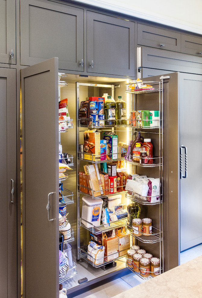 Inspiration for a transitional kitchen pantry remodel in Denver with gray cabinets