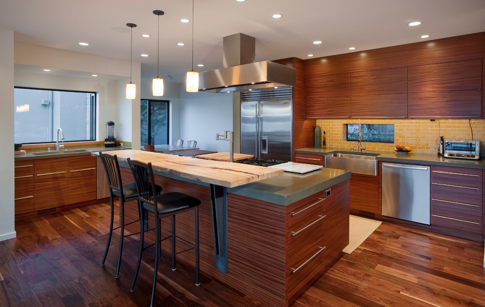 Contemporary kitchen in Seattle with a belfast sink and stainless steel appliances.