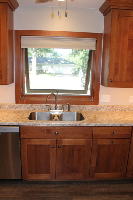https://st.hzcdn.com/simgs/pictures/kitchens/dynasty-by-omega-cabinetry-monterey-door-quarter-sawn-oak-wood-nutmeg-stain-herman-s-kitchen-and-bath-design-img~20f1586e0bd32e3d_4-6038-1-2c1bfbf.jpg