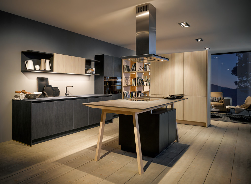 Свежая идея для дизайна: угловая кухня среднего размера в стиле модернизм с обеденным столом, плоскими фасадами и островом - отличное фото интерьера