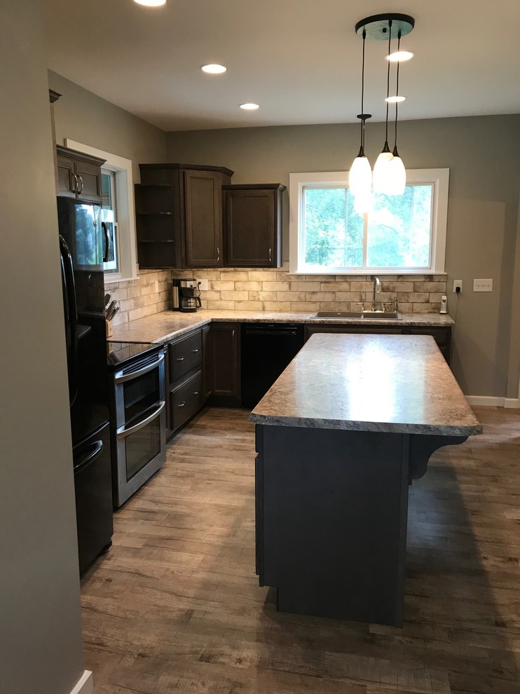 Mid-sized elegant l-shaped vinyl floor and multicolored floor eat-in kitchen photo in Other with a drop-in sink, recessed-panel cabinets, dark wood cabinets, laminate countertops, multicolored backsplash, porcelain backsplash, black appliances and an island