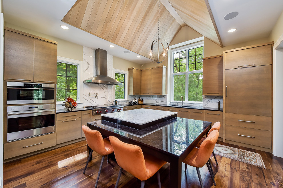Kitchen - mid-sized contemporary l-shaped dark wood floor kitchen idea in Chicago with an undermount sink, flat-panel cabinets, light wood cabinets, granite countertops, white backsplash, an island, stone slab backsplash, stainless steel appliances and black countertops