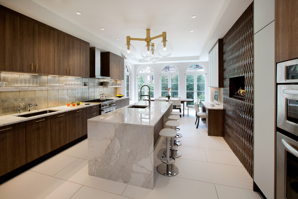 Example of a large trendy porcelain tile eat-in kitchen design in New York with a single-bowl sink, flat-panel cabinets, brown cabinets, marble countertops, metallic backsplash, porcelain backsplash, stainless steel appliances and an island