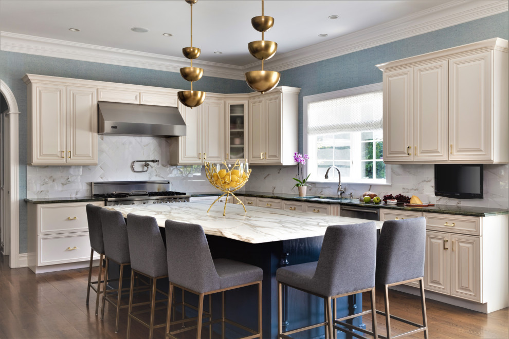 Kitchen - large transitional l-shaped kitchen idea in New York with shaker cabinets, white cabinets, quartz countertops, multicolored backsplash, marble backsplash, an island and multicolored countertops