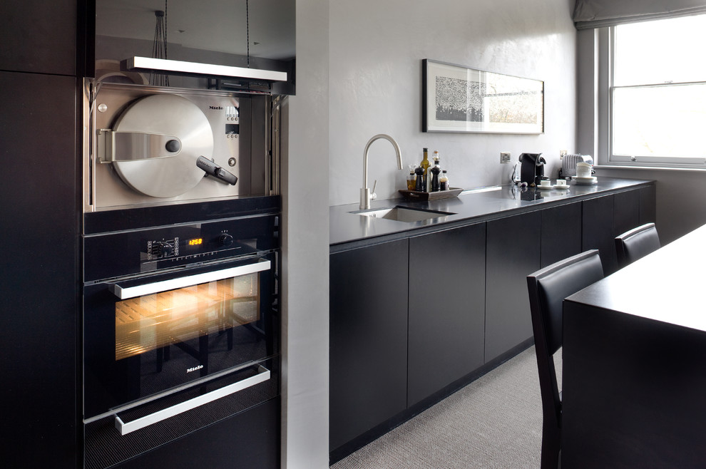 Example of a small trendy kitchen design in London