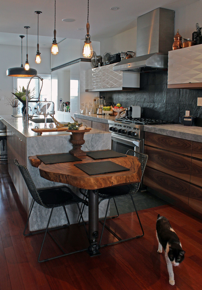 Medium sized bohemian galley kitchen/diner in Toronto with a built-in sink, flat-panel cabinets, medium wood cabinets, marble worktops, grey splashback, slate splashback, stainless steel appliances, slate flooring and an island.