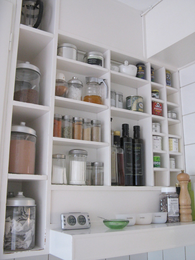 Eclectic kitchen photo in Other with open cabinets and white cabinets