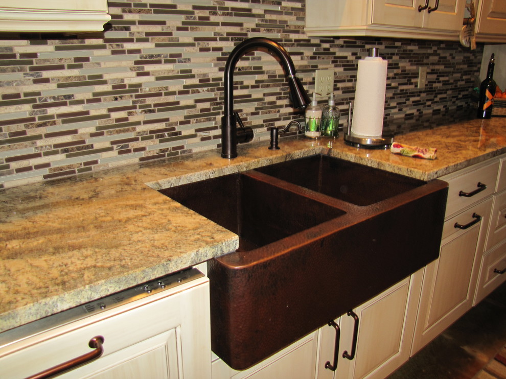 Example of an eclectic kitchen design in Cedar Rapids with a farmhouse sink