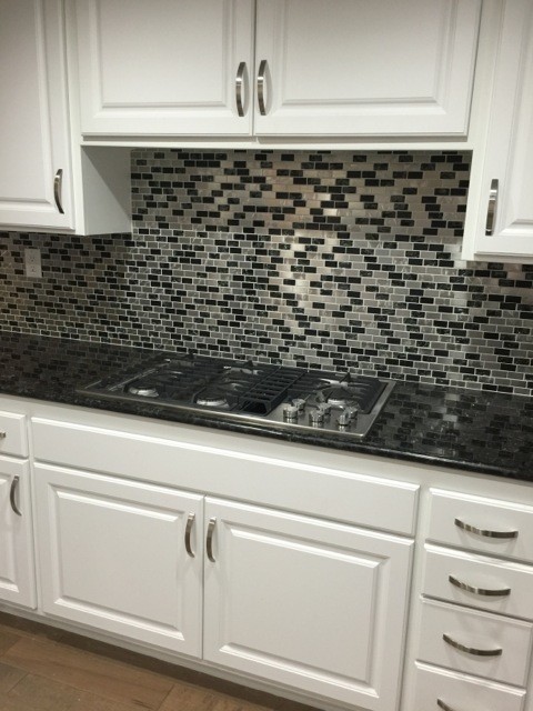 Eden Mosaic Tile Installations: Stainless Steel And Crackled Glass Mix ...