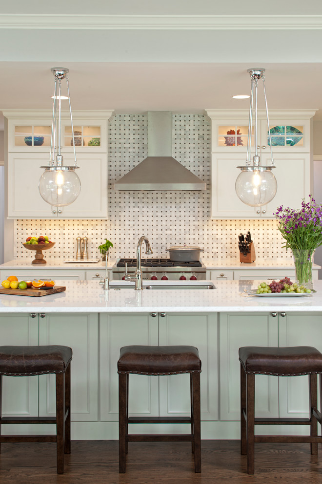 Inspiration for a large timeless u-shaped dark wood floor eat-in kitchen remodel in Minneapolis with an undermount sink, shaker cabinets, white cabinets, multicolored backsplash, stone slab backsplash, stainless steel appliances, an island and quartz countertops