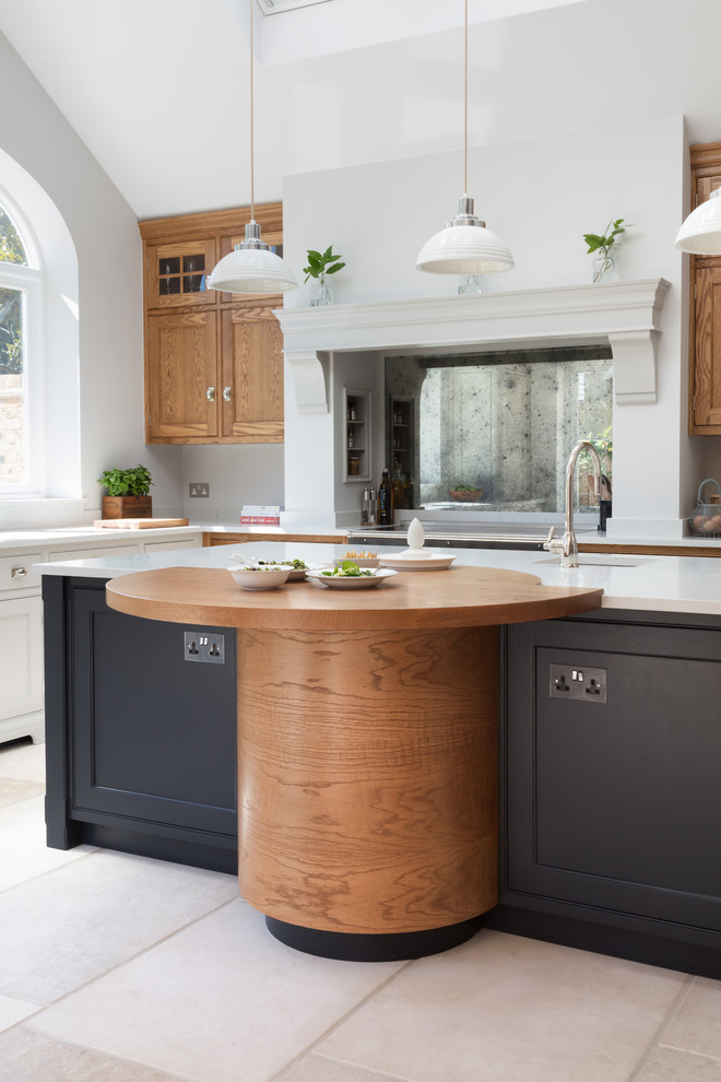 Inspiration for a medium sized traditional l-shaped kitchen in London.