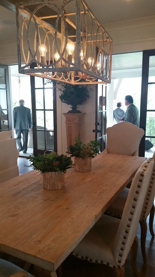 Inspiration for a large craftsman medium tone wood floor dining room remodel in Little Rock