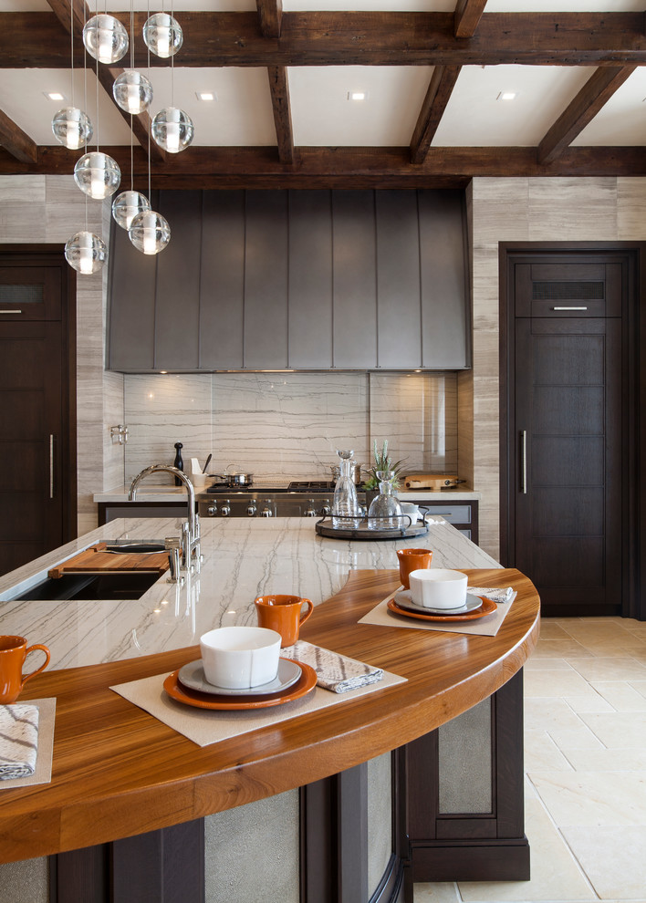 Elegant kitchen photo in Denver with stone slab backsplash and wood countertops