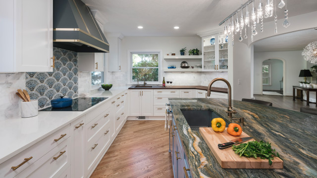 Colorful Vintage-Inspired Kitchen with Brass Accents