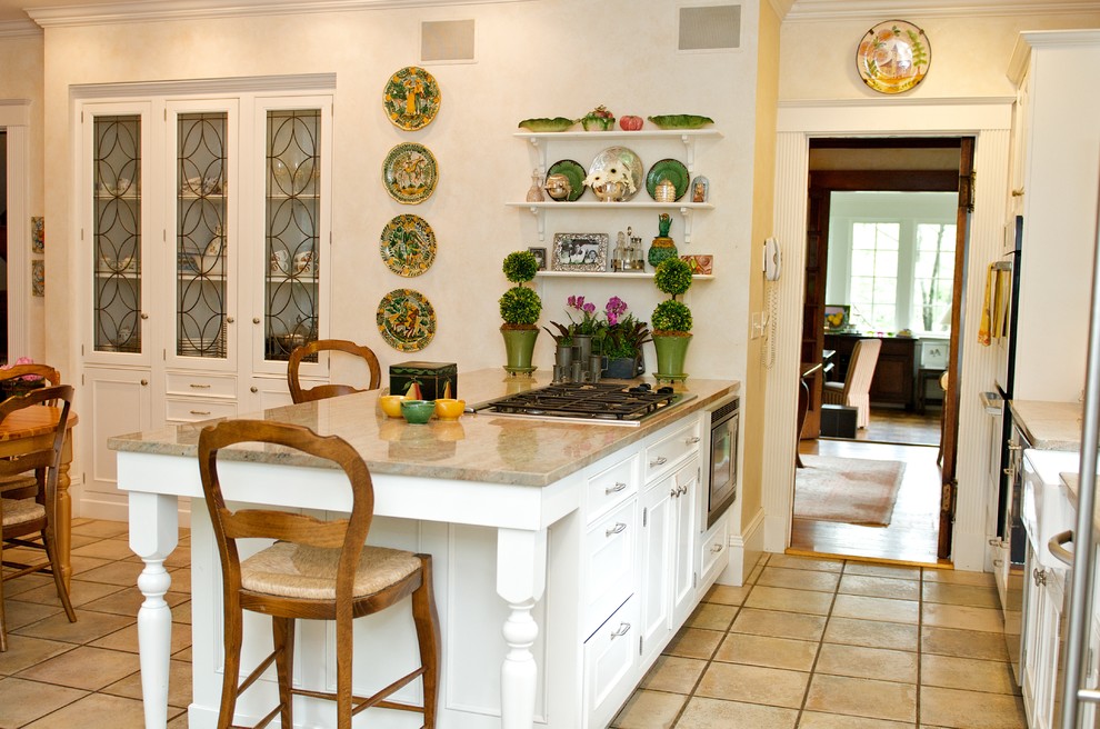 Example of a mid-sized classic single-wall porcelain tile and beige floor eat-in kitchen design in Boston with a farmhouse sink, recessed-panel cabinets, white cabinets, quartz countertops, mirror backsplash, stainless steel appliances and a peninsula