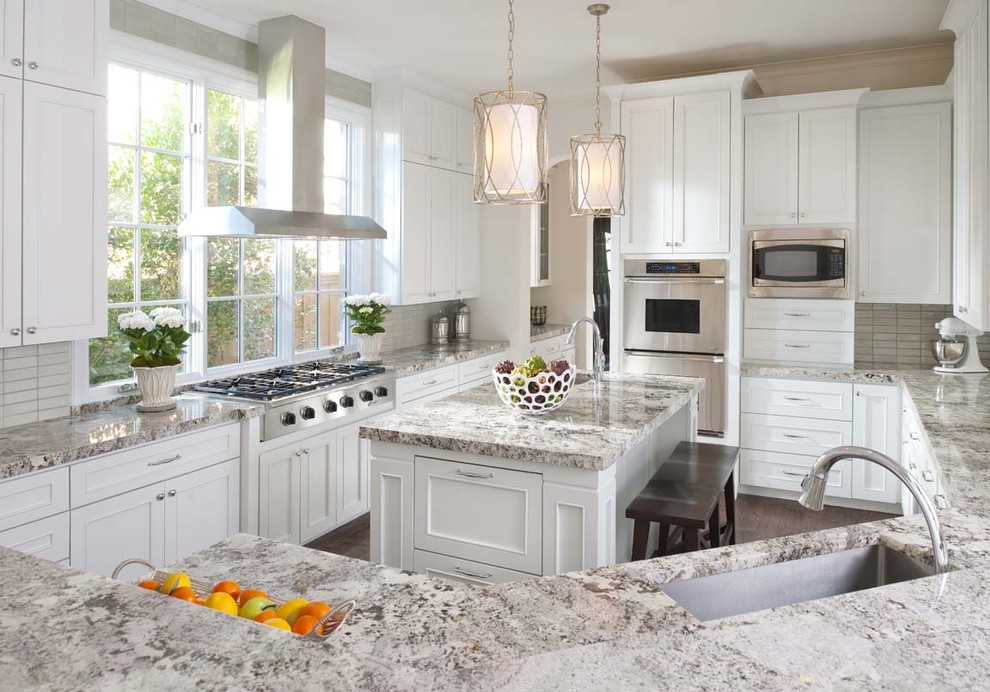 Inspiration for a timeless kitchen remodel in Dallas with stainless steel appliances, granite countertops, recessed-panel cabinets, white cabinets and a single-bowl sink