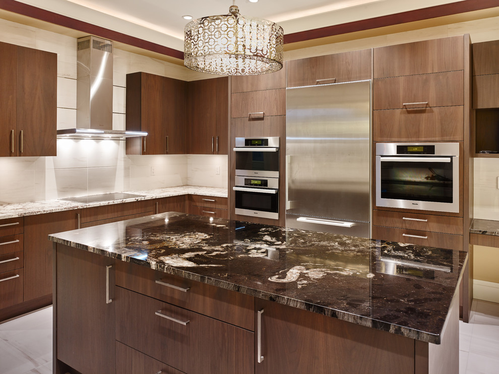 Example of a large transitional u-shaped ceramic tile eat-in kitchen design in Vancouver with an undermount sink, flat-panel cabinets, dark wood cabinets, granite countertops, ceramic backsplash, stainless steel appliances and an island
