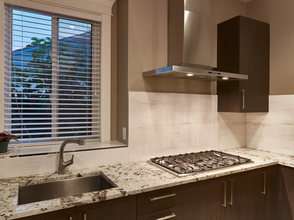 Enclosed kitchen - small transitional single-wall ceramic tile enclosed kitchen idea in Vancouver with an undermount sink, flat-panel cabinets, dark wood cabinets, granite countertops, ceramic backsplash, stainless steel appliances and no island