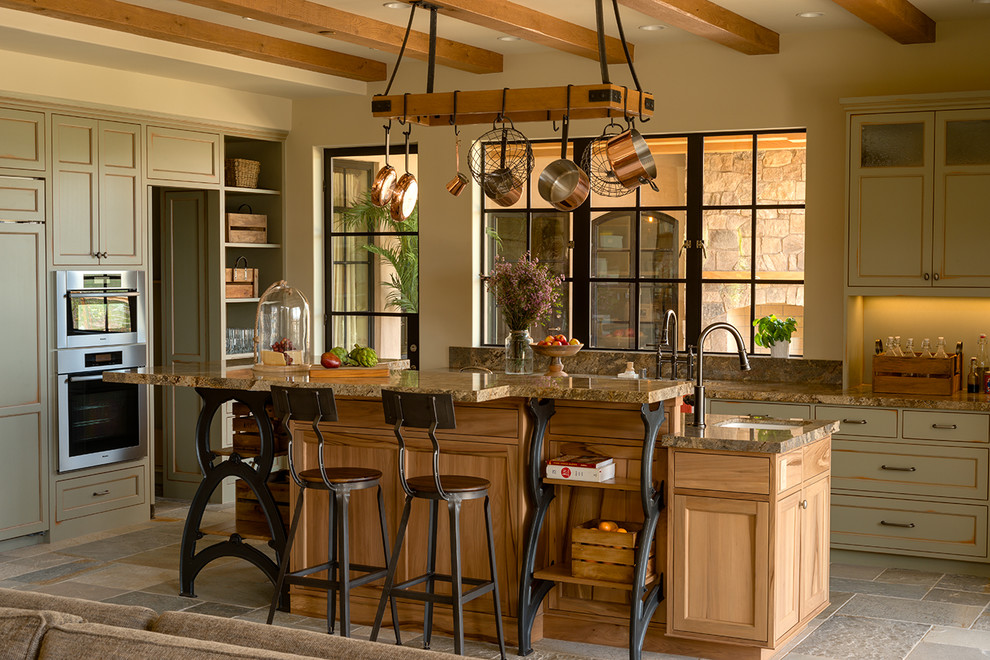 Inspiration for a rural open plan kitchen in Los Angeles with a submerged sink, stainless steel appliances and an island.