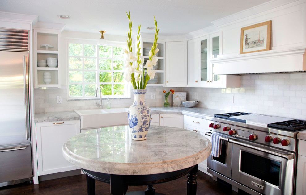 Example of a classic kitchen design in Salt Lake City with stainless steel appliances and a farmhouse sink