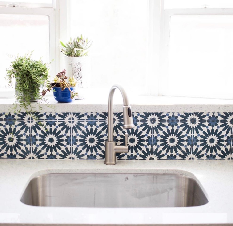 This is an example of a medium sized contemporary kitchen in Phoenix with cement tile splashback, a submerged sink and multi-coloured splashback.