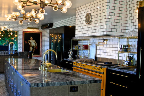 European Industrial kitchen with gold accents