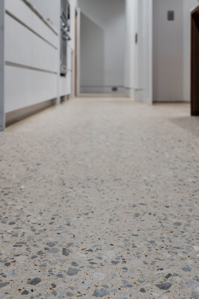 Exposed Aggregate Polished Concrete Floor in Luxury Residential Kitchen