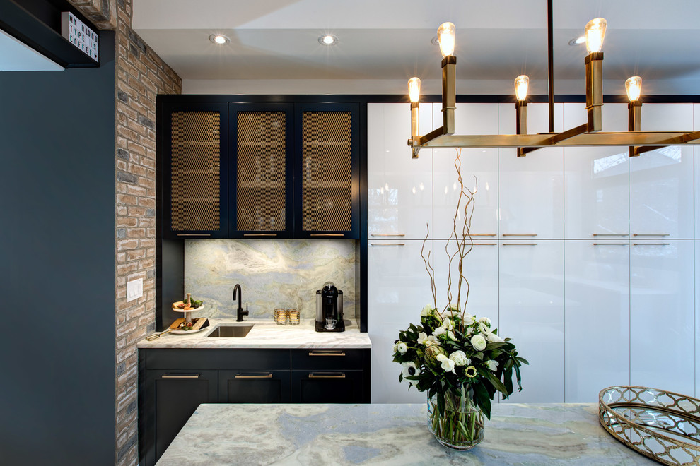 Inspiration for a small contemporary galley light wood floor and yellow floor eat-in kitchen remodel in Toronto with an undermount sink, flat-panel cabinets, blue cabinets, quartzite countertops, white backsplash, slate backsplash, stainless steel appliances and an island