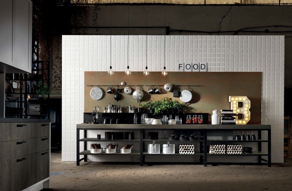 Immagine di una grande cucina ad U industriale