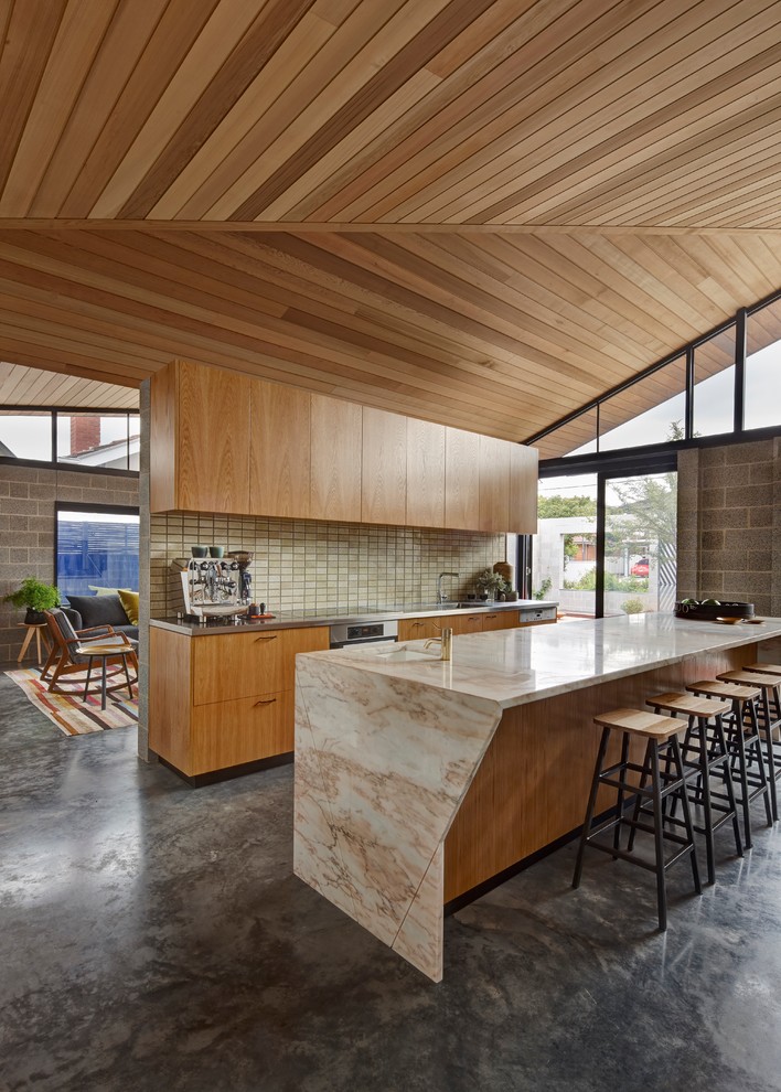Design ideas for a medium sized contemporary galley kitchen in Melbourne with an island.
