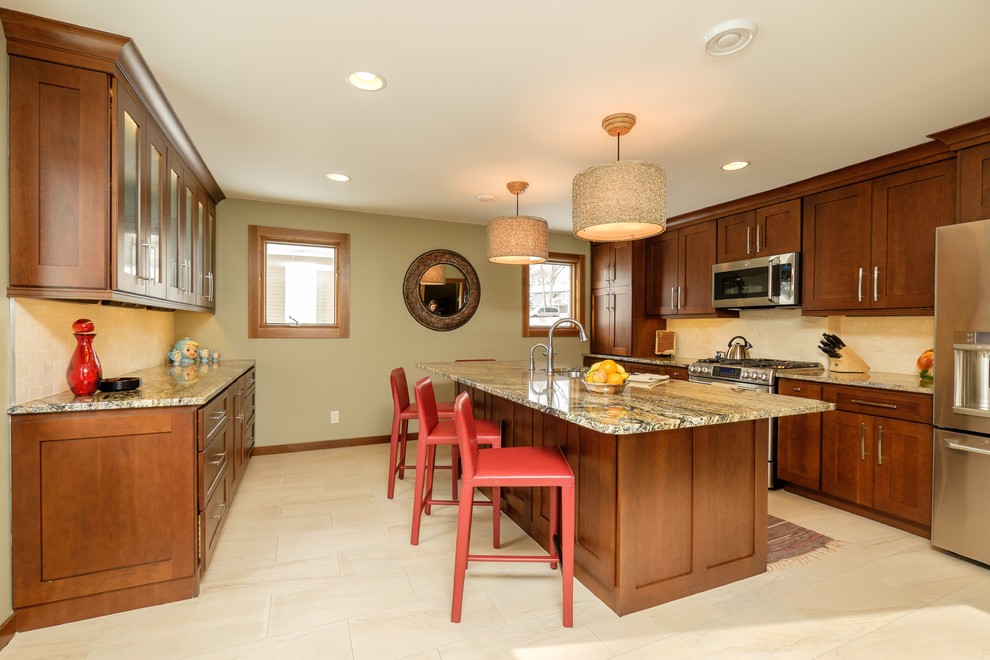 Mid-sized transitional u-shaped porcelain tile eat-in kitchen photo in Minneapolis with an undermount sink, flat-panel cabinets, medium tone wood cabinets, granite countertops, white backsplash, stone tile backsplash, stainless steel appliances and an island
