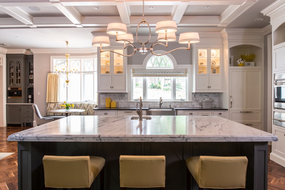 Eat-in kitchen - huge transitional l-shaped dark wood floor eat-in kitchen idea in Dallas with a farmhouse sink, shaker cabinets, white cabinets, marble countertops, white backsplash, mosaic tile backsplash, stainless steel appliances and an island