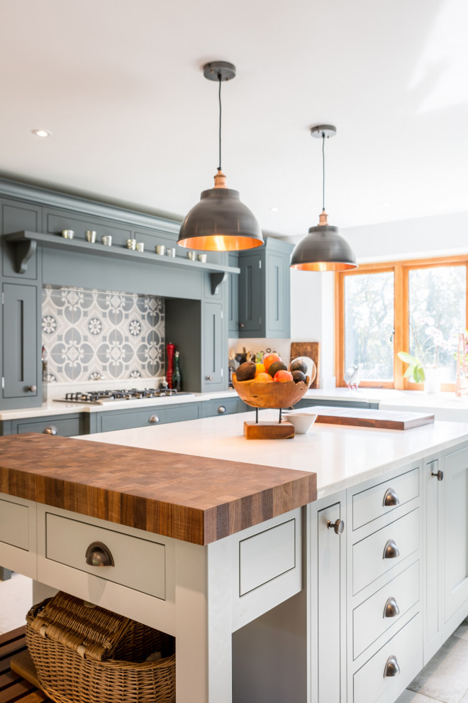 Inspiration for a large farmhouse u-shaped eat-in kitchen remodel in Sussex with shaker cabinets, gray cabinets, quartzite countertops, an island and white countertops