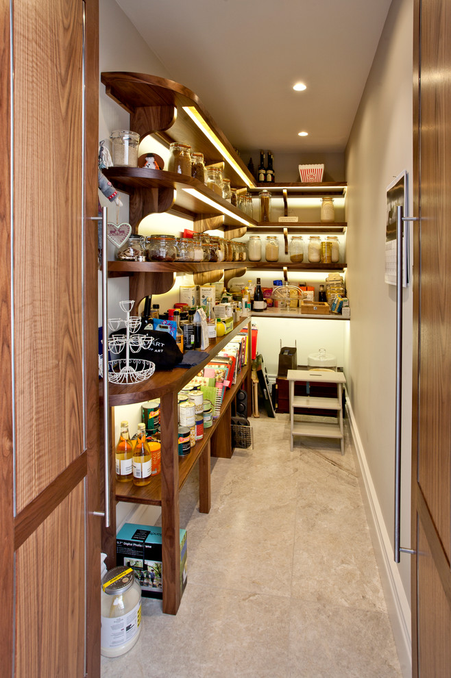 Photo of a country kitchen pantry in Hampshire with open cabinets and medium wood cabinets.