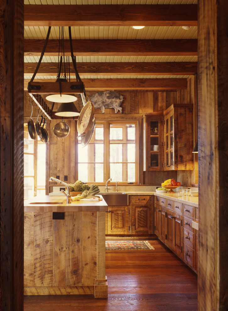 Example of a mountain style kitchen design in San Francisco with a farmhouse sink