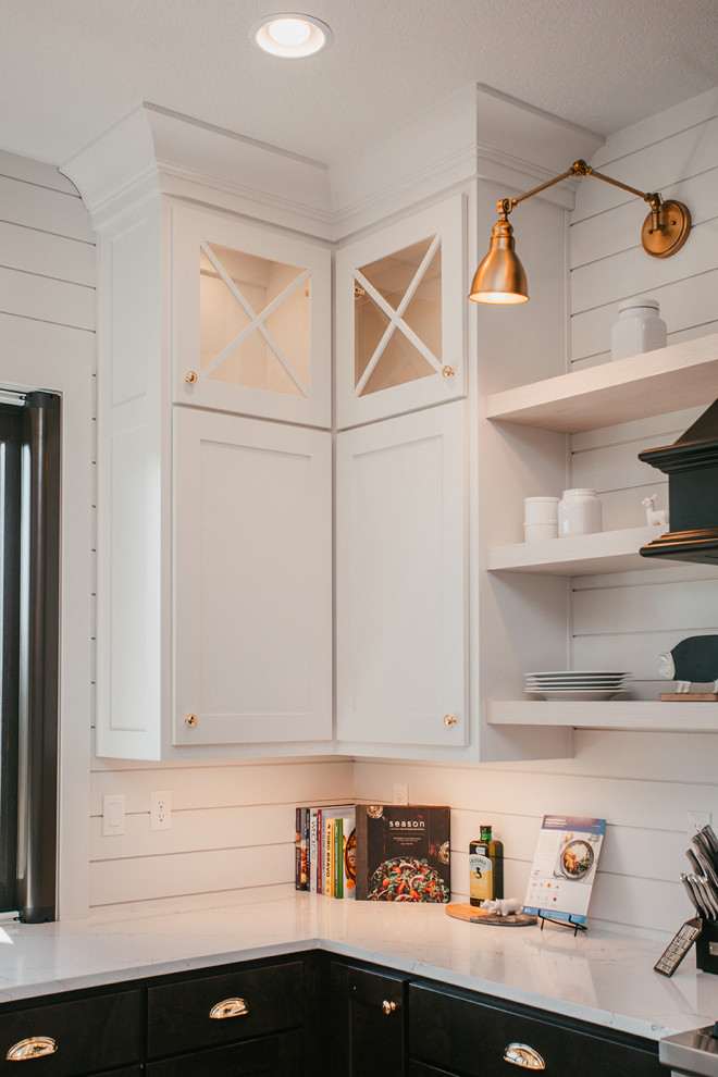 Inspiration for a huge cottage u-shaped medium tone wood floor and brown floor kitchen remodel in Portland with a farmhouse sink, shaker cabinets, dark wood cabinets, quartz countertops, white backsplash, shiplap backsplash, an island and white countertops