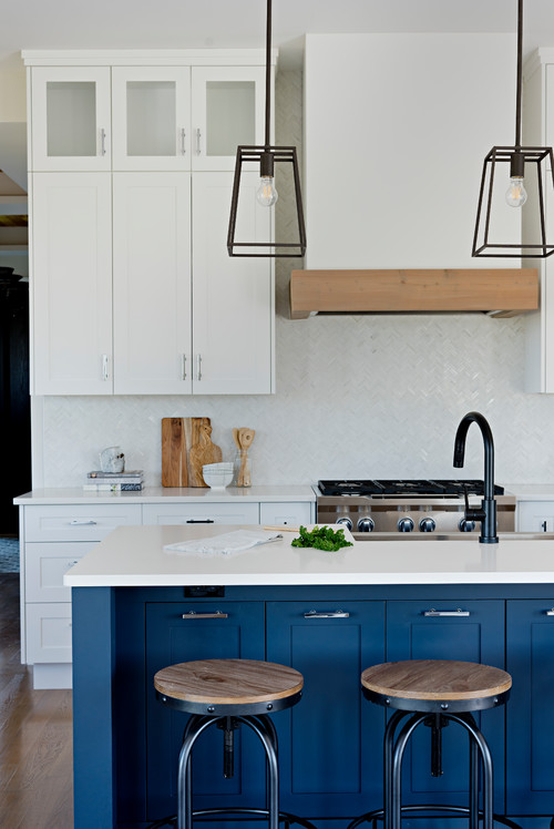 Pendant-Lit Tranquility: Modern Farmhouse Kitchen Ideas with White and Blue Cabinets