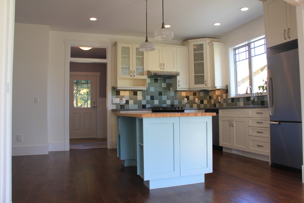 Inspiration for a rural kitchen/diner in Vancouver with shaker cabinets and blue cabinets.