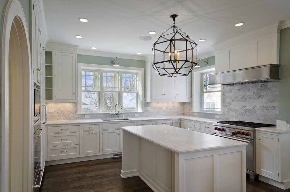 Traditional kitchen in Salt Lake City with a submerged sink, recessed-panel cabinets, white cabinets and stainless steel appliances.