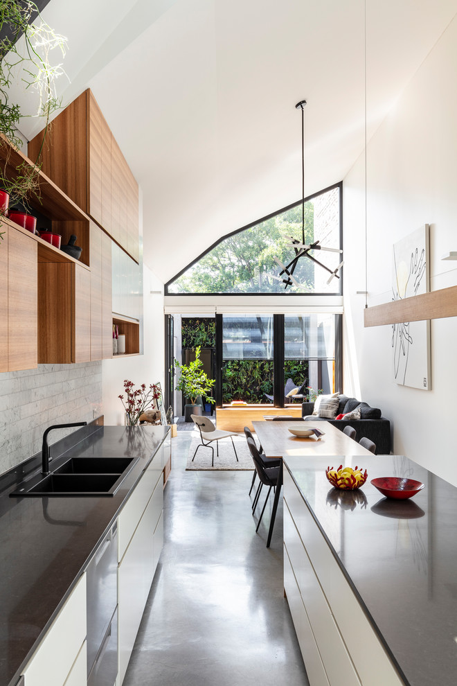 Example of a mid-sized trendy kitchen design in Sydney