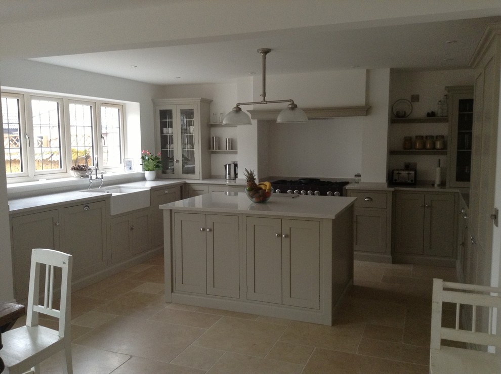 This is an example of a large contemporary u-shaped kitchen/diner in Other with shaker cabinets, grey cabinets, marble worktops, limestone flooring and an island.